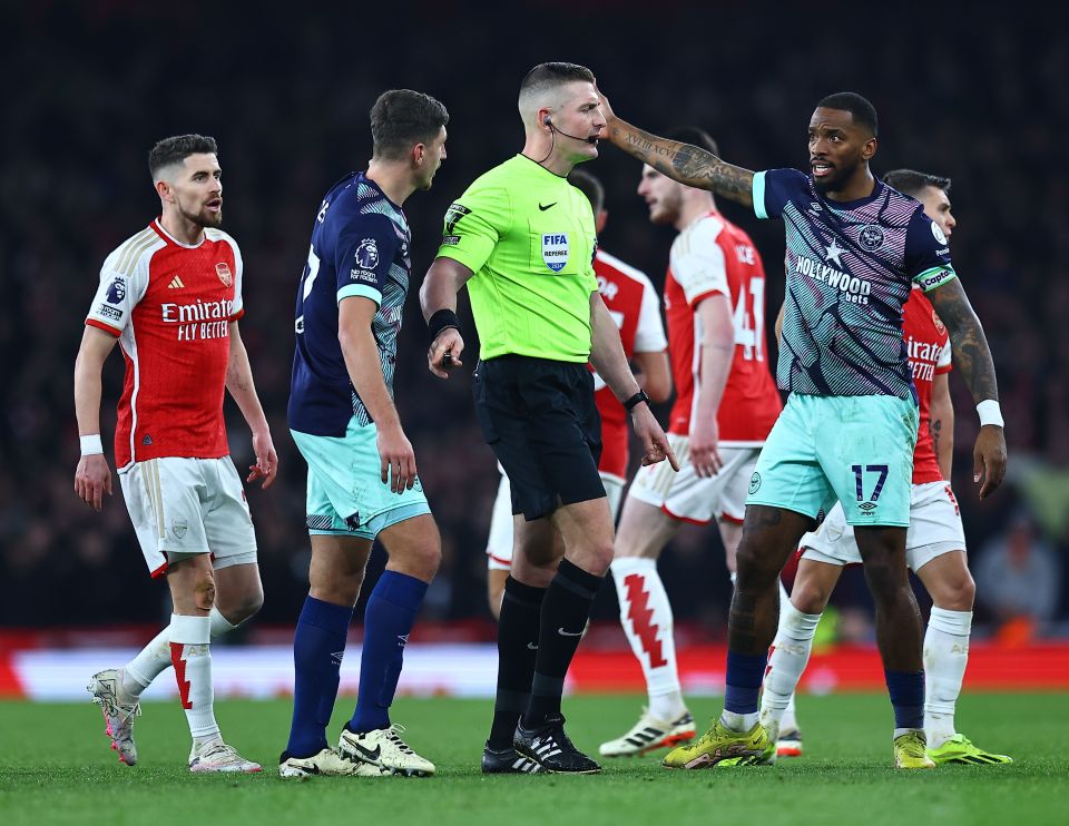 Brentford players confronted ref Rob Jones after their controversial defeat at Arsenal