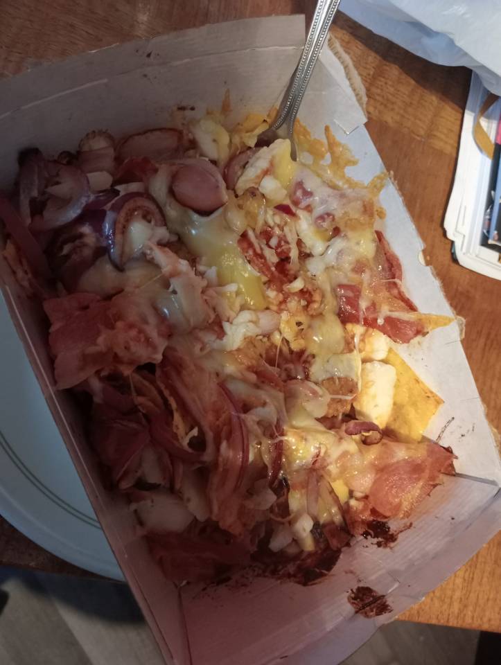 A woman showed how she created a 'make-your-own' nacho dish from the pizza counter at Morrions