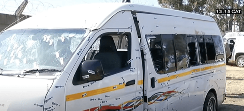 A picture showing a taxi riddled with bullets in South Africa