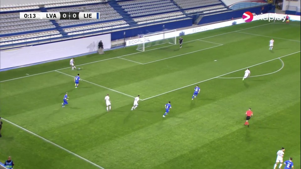 Latvia defender Marcis Oss played the ball back without looking where his keeper was