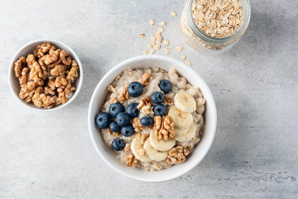 Porridge topped with fruit and nuts is a healthy breakfast option