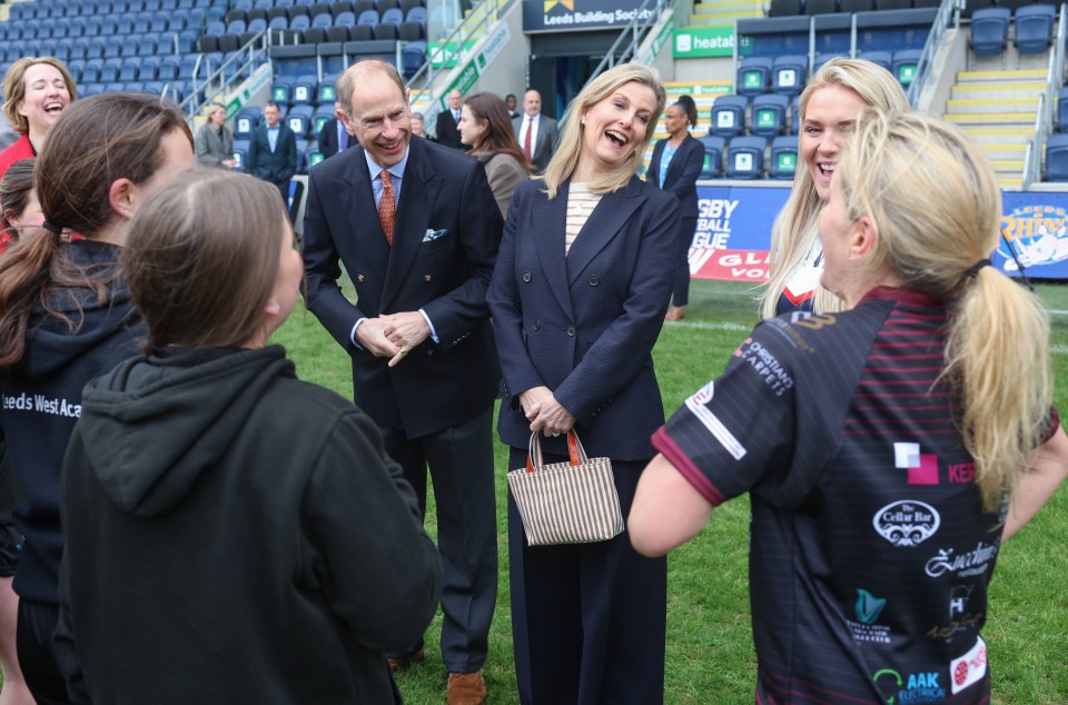 The couple laughed as they chatted with children and members of the Leeds Rhinos Women Rugby League team