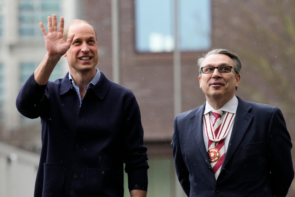 William smiled and waved at gathering crowds while chatting animatedly with Mr McGranth