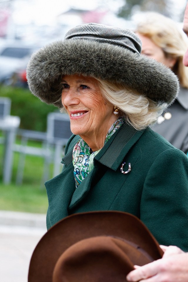 Camilla is wearing her Horseshoe Brooch, which pays tribute to one of King Edward VIl's most successful thoroughbred racehorses