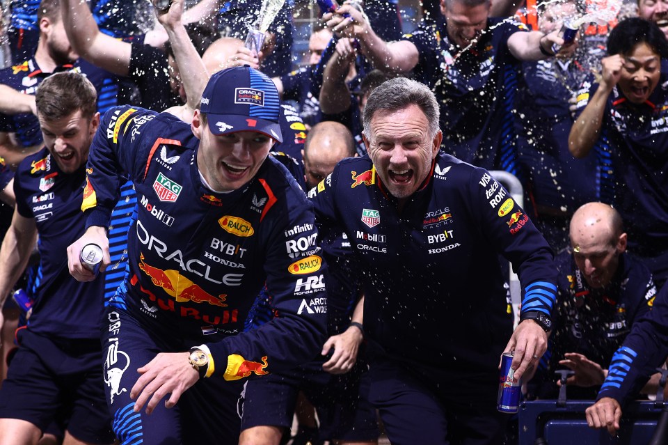 Max celebrates his GP victory in Bahrain alongside Horner and the Oracle Red Bull Racing team