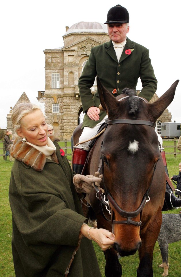 Princess Michael of Kent (L) strokes the horse of Captain Farquhar in 2005