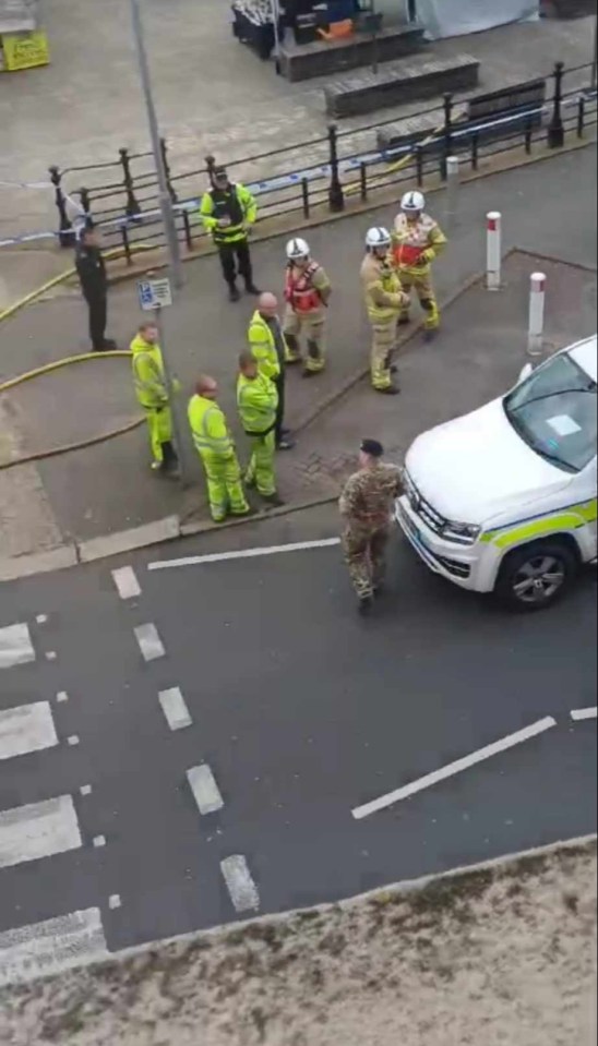 Police, firefighters, and soldiers in Darwen's Market Square