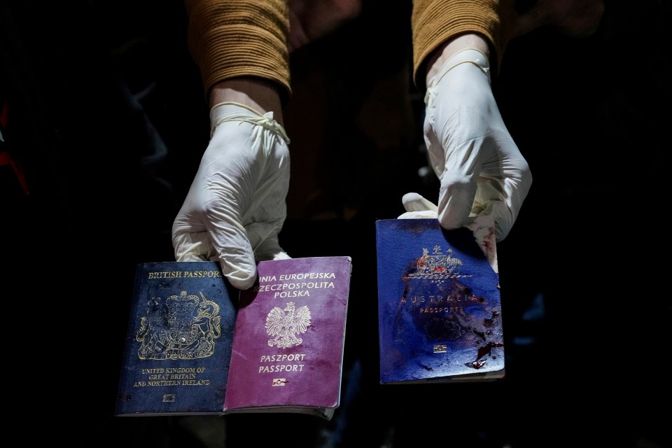Blood-stained British, Polish, and Australian passports were found after the airstrike