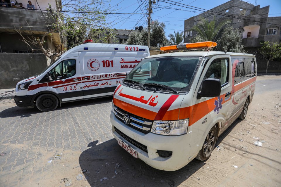 Medics prepare the bodies of World Central Kitchen workers, who were killed in Israeli air strikes, for their return to their home counties