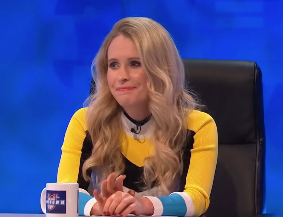 a woman sits at a table with a mug that says ' afternoon news ' on it