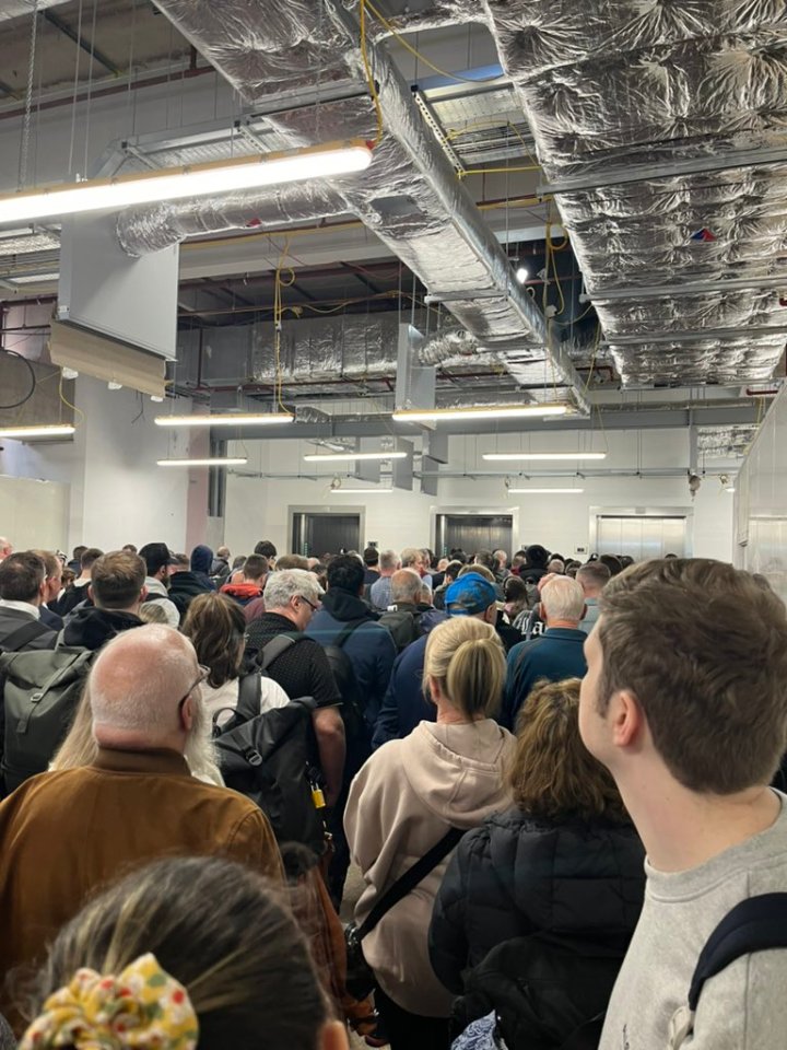 Travellers waited in lengthy queues at Birmingham Airport on Monday