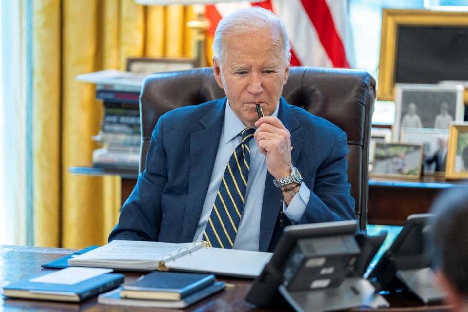 U.S. President Joe Biden speaks on the phone with Israeli Prime Minister Benjamin Netanyahu in this White House handout image taken in the Oval Office in Washington, U.S., April 4, 2024. The White House/Handout via REUTERS THIS IMAGE HAS BEEN SUPPLIED BY A THIRD PARTY
