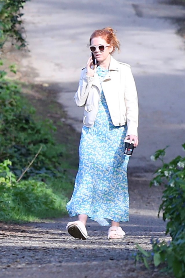 EXCLUSIVE: **PREMIUM EXCLUSIVE RATES APPLY** NO WEB BEFORE 3PM BST, 10th APRIL 2024 -- Isla Fisher Is Seen For The First Time - Without Her Wedding Ring - After Announcing Her Split From Sacha Baron Cohen. The actress was spotted walking her dog in north London, days after she revealed she and the Borat star had jointly filed to end their marriage last year. Isla looked downcast and chatted on the phone during her stroll. Pictured: Isla Fisher Ref: SPL10817876 100424 EXCLUSIVE Picture by: SplashNews.com Splash News and Pictures **USE CHILD PIXELATED IMAGES OR FOOTAGE IF YOUR TERRITORY REQUIRES IT** USA: 310-525-5808 UK: 020 8126 1009 eamteam@shutterstock.com World Rights