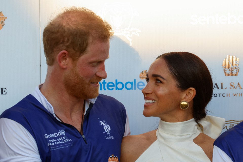 Harry and Meghan exchanged charged glances with each other