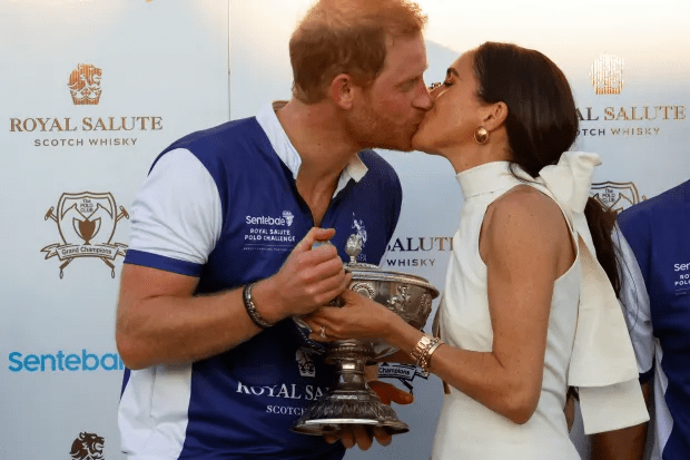 Meghan and Harry put on a loved up display