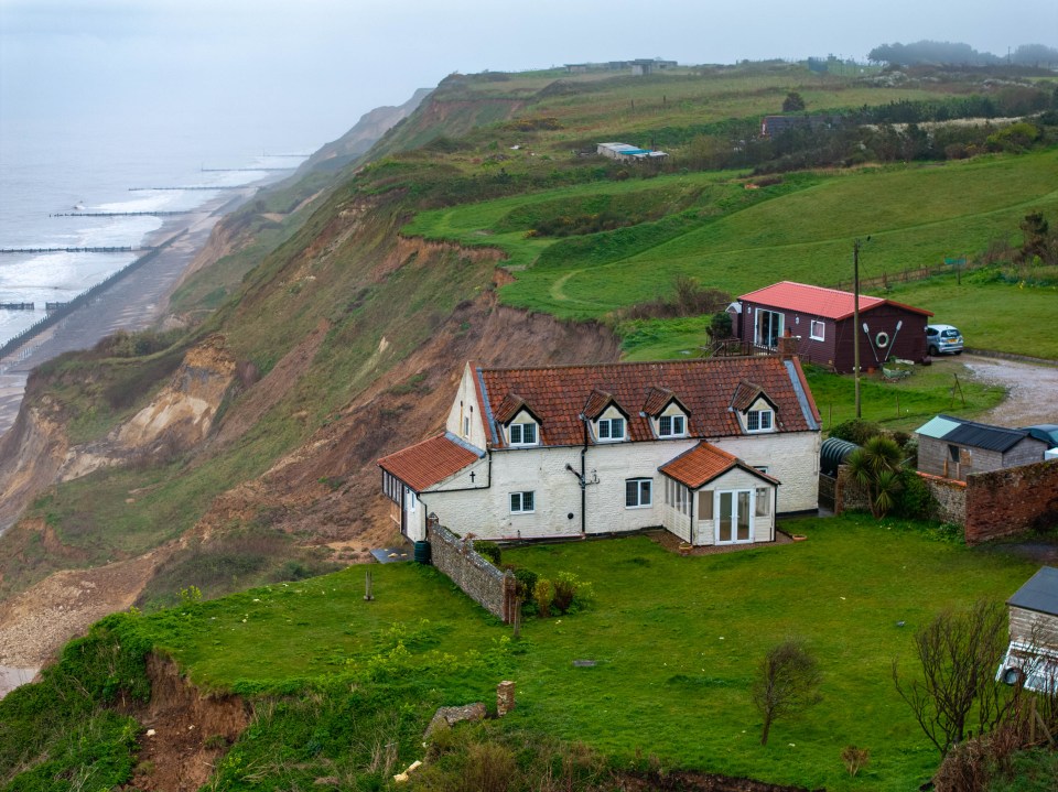 Following a cliff face fall, one property in Trimingham now hangs over the edge