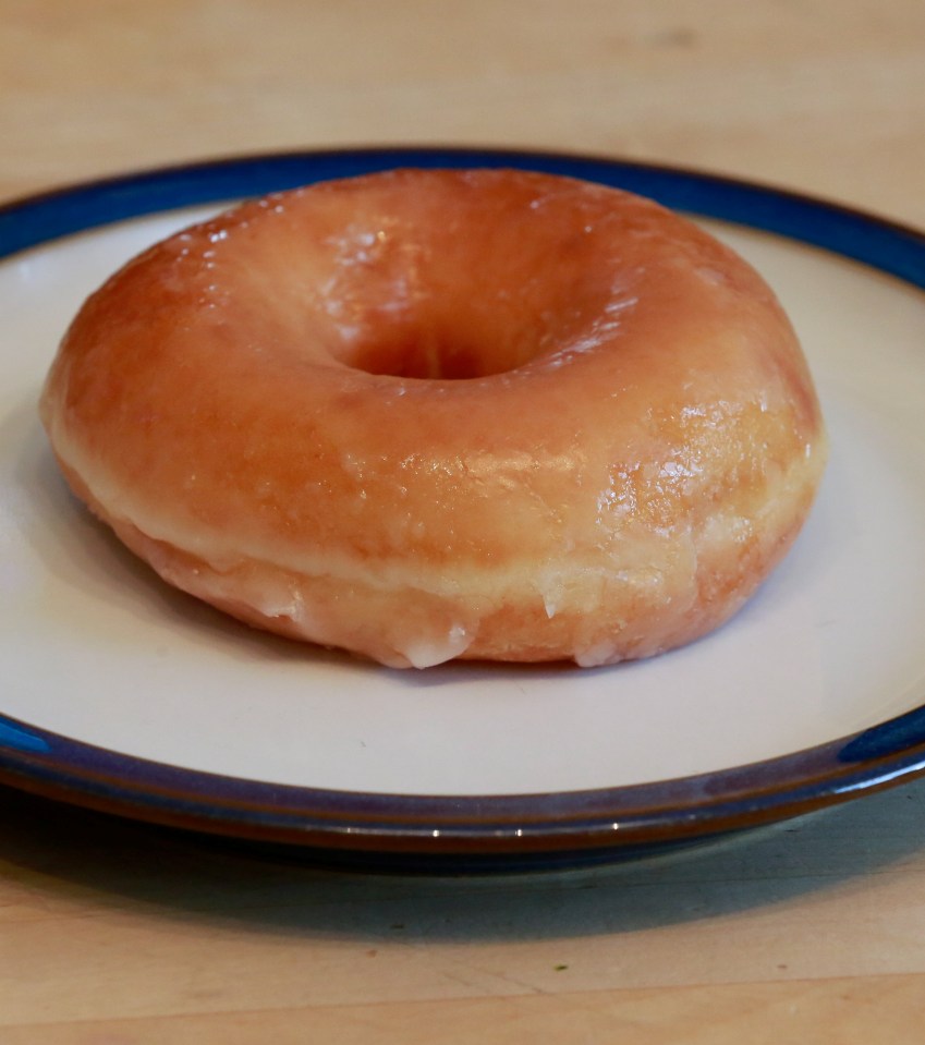 Krispy Kreme 'glazed ring' donut, June 13 2019.  See SWNS story SWBRdoughnut. A City boss has been suspended after sending a lewd joke about a female colleague's love of 'glazed rings' to everyone in the company. James Conmy, a senior Vice President of Global Marine and Energy at international insurance firm Guy Carpenter, bought doughnuts to celebrate his birthday. He sent an email to his colleagues entitled 'Birthday Treats' in which he made a lewd reference to his colleague Soraya Faoussi. It read: "There are doughnuts on Alf's desk as it is my birthday today. I hope people like Krispy Kremes - I know Soraya enjoys a glazed ring."