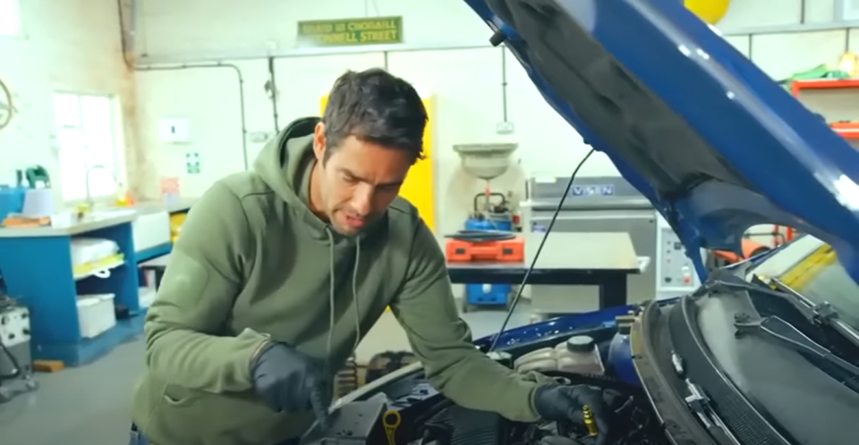 Elvis takes the motor apart and repairs the engine