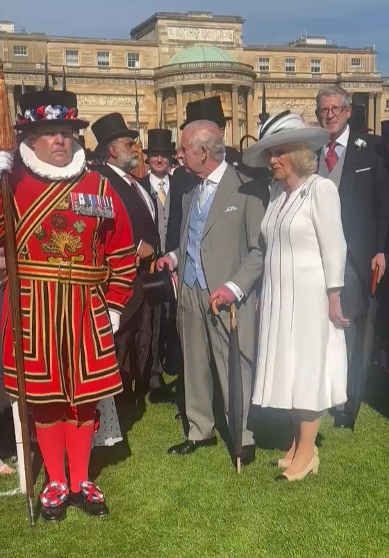 The moment Charles stopped to greet as many people as he could
