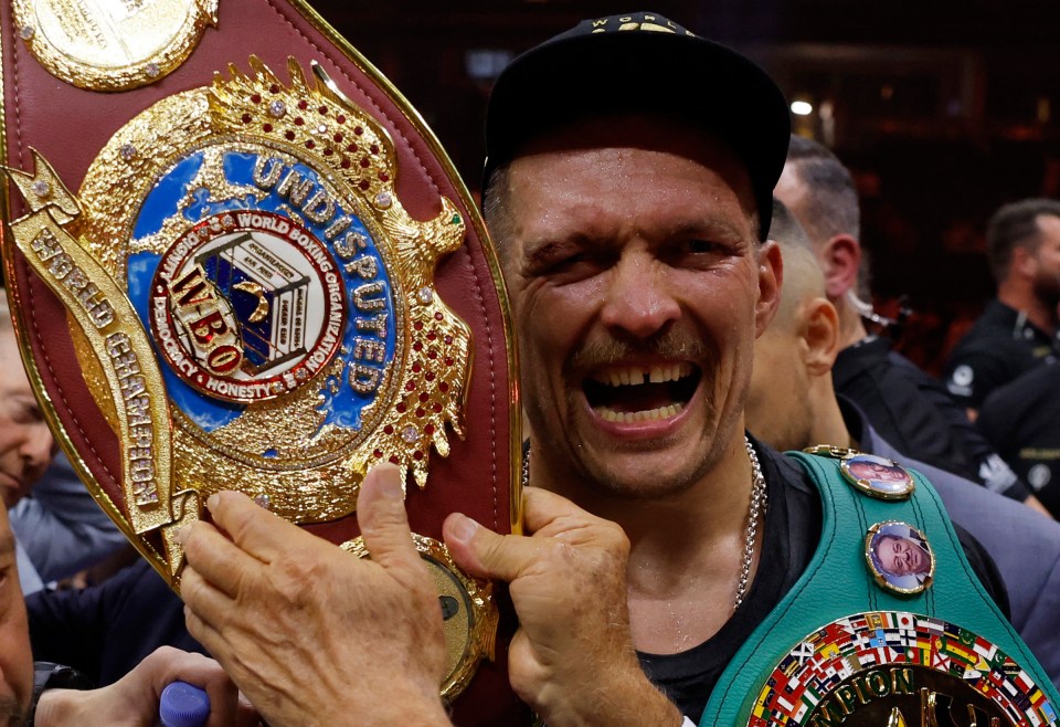 Oleksandr Usyk celebrates victory over Tyson Fury