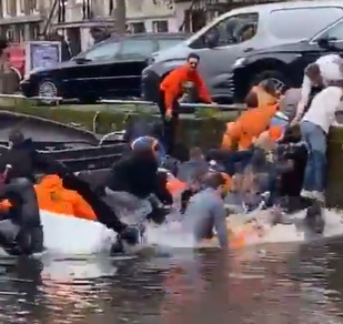 Around 20 of the revellers were left causing a big splash in the canal