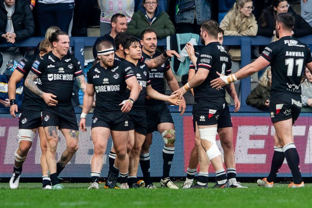 London Broncos rugby players celebrating.