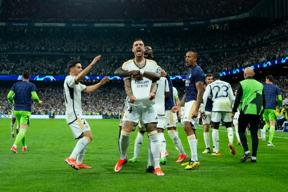 MADRID, SPAIN - MAY 08: Joselu of Real Madrid celebrates scoring his side's first goal during the UEFA Champions League semi-final second leg match between Real Madrid and FC Bayern München at Estadio Santiago Bernabeu on May 08, 2024 in Madrid, Spain. (Photo by Chris Brunskill/Fantasista/Getty Images)