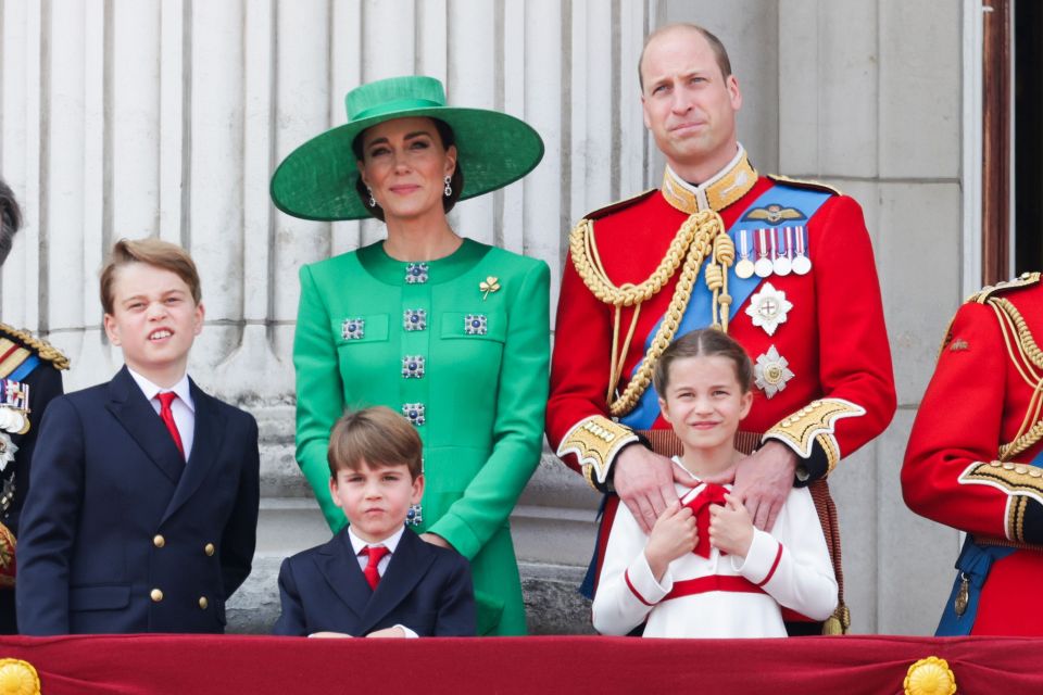 LONDON, ENGLAND - JUNE 17: Prince George of Wales, Prince Louis of Wales, Catherine, Princess of Wales, Princess Charlotte of Wales and Prince William, Prince of Wales stand on the balcony of Buckingham Palace to watch a fly-past of aircraft by the Royal Air Force during Trooping the Colour on June 17, 2023 in London, England. Trooping the Colour is a traditional parade held to mark the British Sovereign's official birthday. It will be the first Trooping the Colour held for King Charles III since he ascended to the throne. (Photo by Chris Jackson/Getty Images)