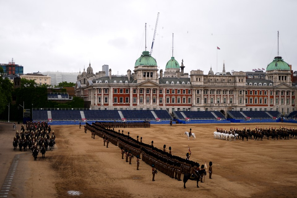 Troops of the Household Division take part in the Brigade Major's Review, the final rehearsal of Trooping the Colour, the birthday parade for King Charles III, on Horse Guards Parade, Whitehall, London. Picture date: Thursday May 30, 2024. PA Photo. All seven regiments of the Household Division and their Regimental Bands are taking part in the "khaki rehearsal", including the five regiments of the Foot Guards: the Grenadier Guards, the Coldstream Guards, the Scots Guards, the Irish Guards, the Welsh Guards, the Household Cavalry Mounted Regiment (made up of The Life Guards and The Blues and Royals), the mounted band of the Household Cavalry, and the massed Foot Guards bands.¿See PA story ROYAL Review. Photo credit should read: Jordan Pettitt/PA Wire