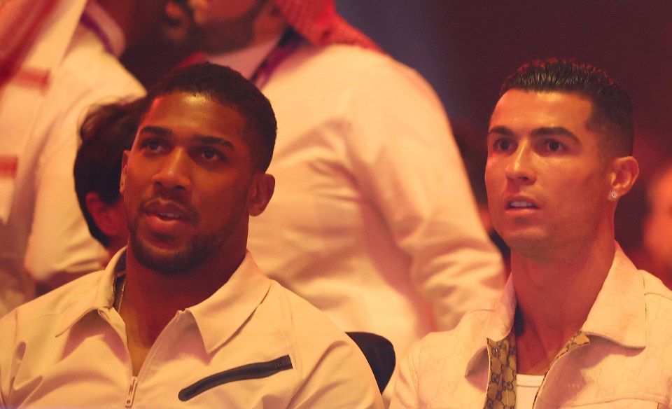 Anthony Joshua and Cristiano Ronaldo watched on from ringside