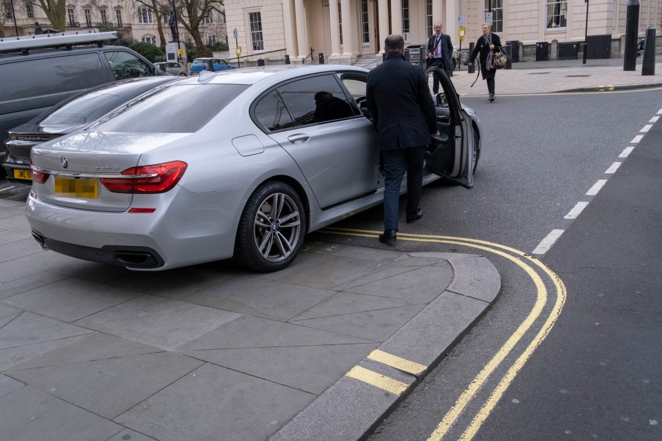 A motorist is seen with a badly-parked BMW car, reversed across a double-yellow line and the kerb and on to the pavement, on the corner of Pall Mall in central London, on 9th February 2022, in London, England. (Photo by Richard Baker / In Pictures via Getty Images)