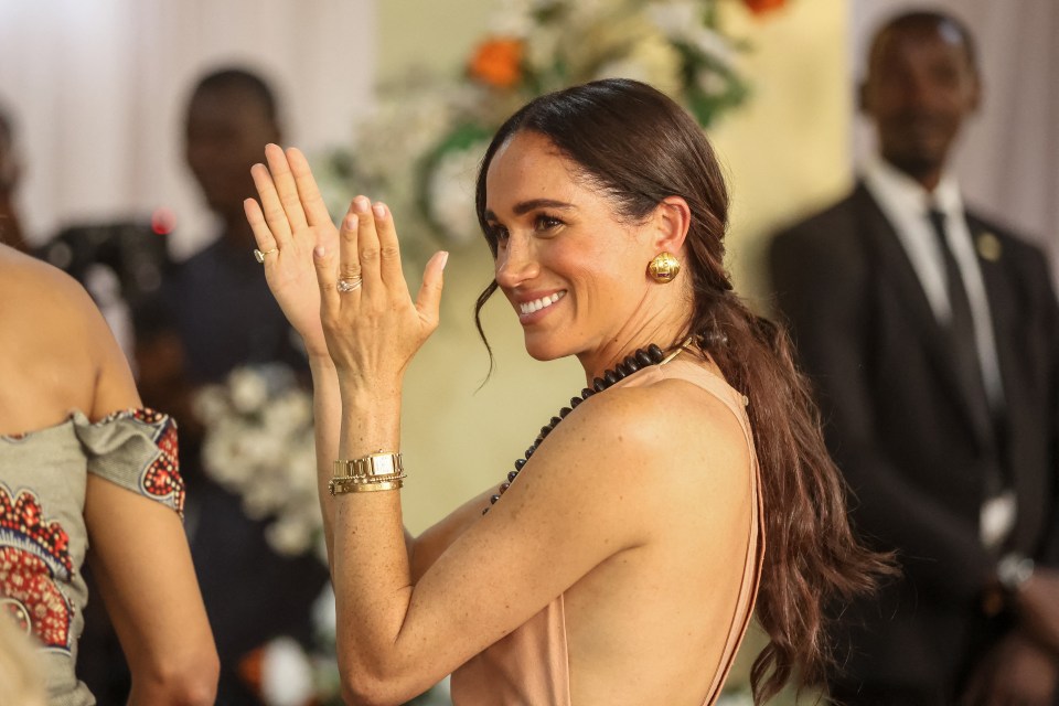 The Duchess looked incredible in the £450 gown, which, from certain angles, looked completely backless