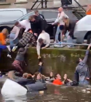 Those who managed to make the ambitious leap had to help their soggy pals up from the cold canal
