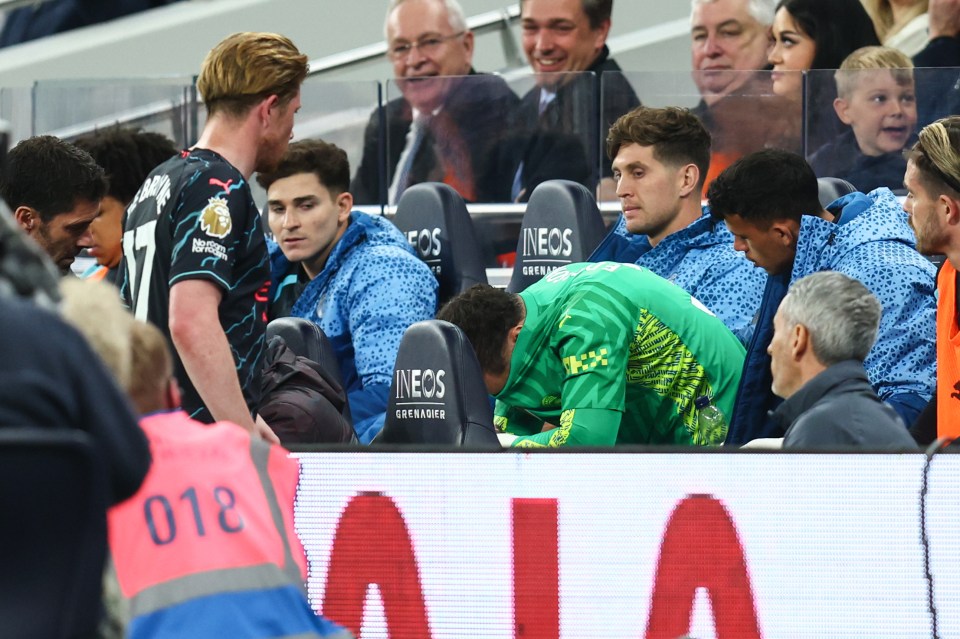 Ederson then covered his face as he appeared to be crying as pals consoled him