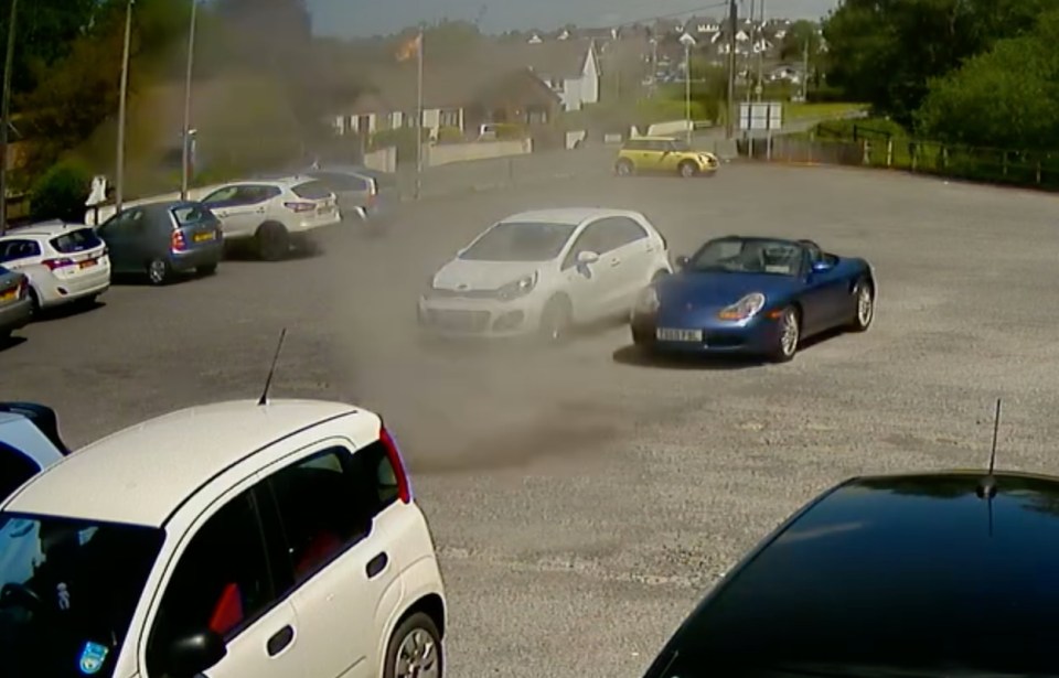 Village drinkers were forced to flee and take shelter in a pub after a 'mini tornado' ripped through the car park