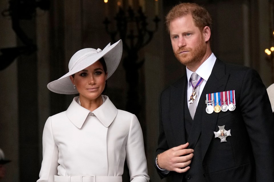 Prince Harry and Meghan Markle at a service.
