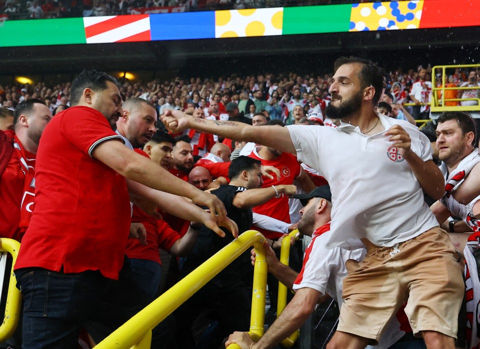 Turkey and Georgia fans clash before the match