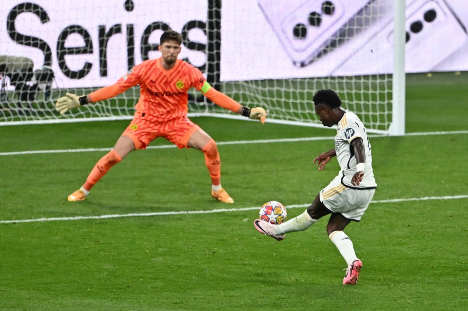 LONDON, ENGLAND - JUNE 01: Vinicius Junior of Real Madrid scores his team's second goal during the UEFA Champions League 2023/24 Final match between Borussia Dortmund and Real Madrid CF at Wembley Stadium on June 01, 2024 in London, England. (Photo by Dan Mullan/Getty Images)