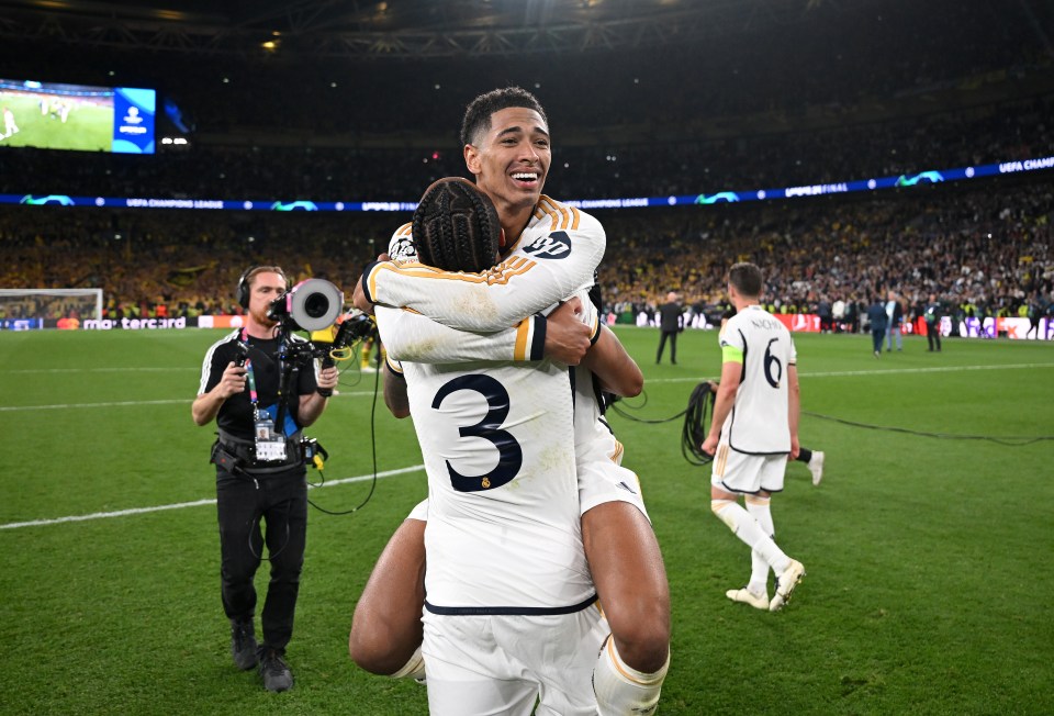 LONDON, ENGLAND - JUNE 01: Jude Bellingham and Eder Militao of Real Madrid  during the UEFA Champions League 2023/24 Final match between Borussia Dortmund and Real Madrid CF at Wembley Stadium on June 01, 2024 in London, England. (Photo by Michael Regan - UEFA/UEFA via Getty Images)