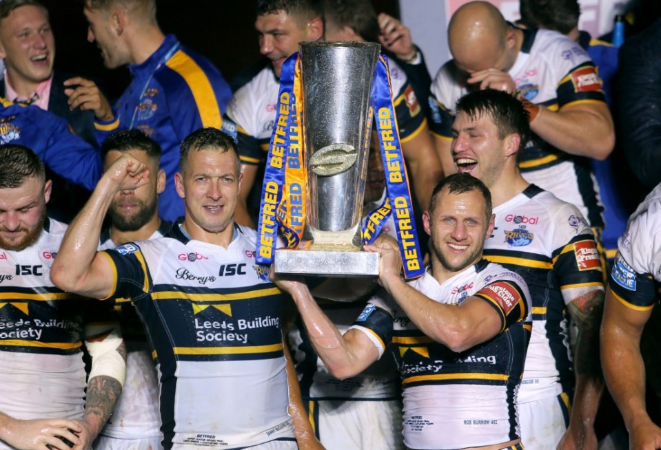 File photo dated 07-10-2017 of Leeds Rhinos' Rob Burrow and Danny McGuire celebrate with the Super League Grand Final trophy PRESS ASSOCIATION Photo. Issue date: Friday January 26, 2018. Champions Leeds must regroup once more after losing two more of their iconic players in Danny McGuire and Rob Burrow. See PA story RUGBYL Super Overview. Photo credit should read Richard Sellers/PA Wire.