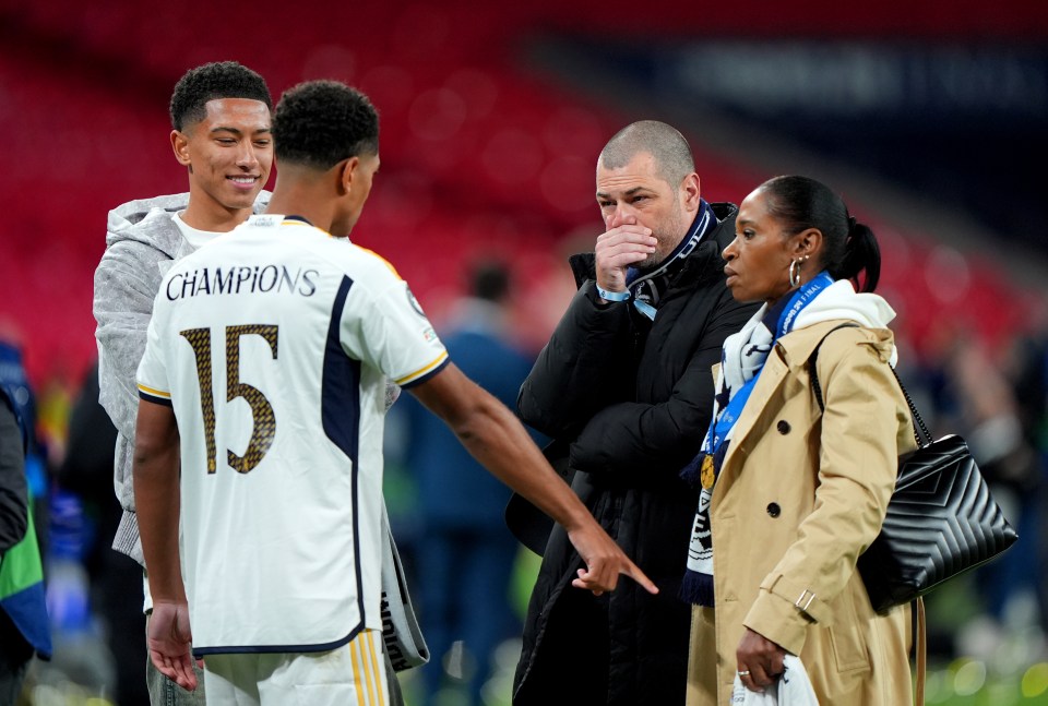 Real Madrid's Jude Bellingham speaks to his parents Mark Bellingham, Denise Bellingham and brother Jobe Bellingham after winning the UEFA Champions League final at Wembley Stadium in London. Picture date: Saturday June 1, 2024. PA Photo. See PA story SOCCER Champions League. Photo credit should read: Joe Giddens/PA Wire. RESTRICTIONS: Use subject to restrictions. Editorial use only, no commercial use without prior consent from rights holder.