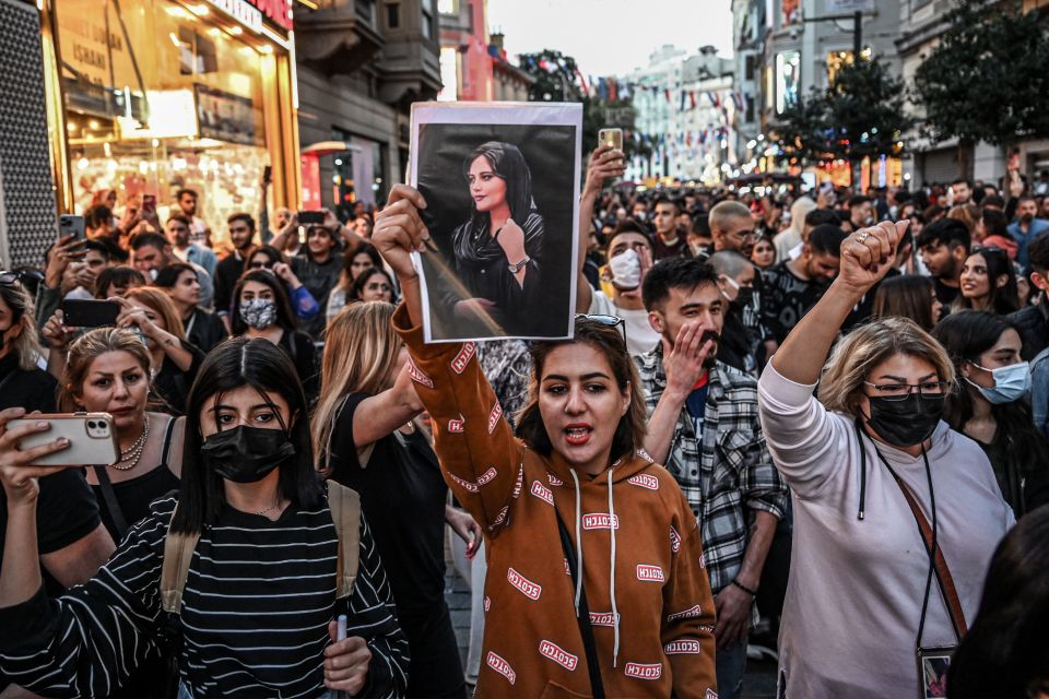 Iranian protesters march and chant in capital Tehran