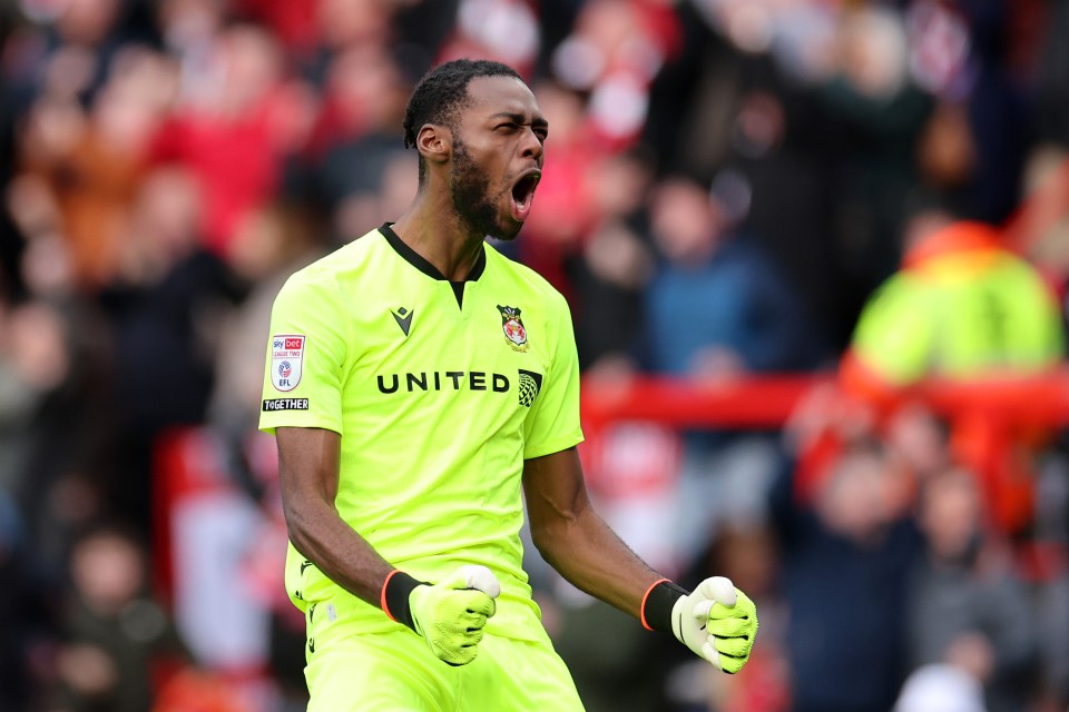 Arthur Okonkwo has returned to Wrexham on a three-year deal