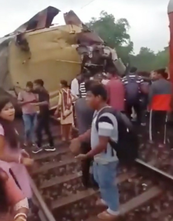 (TAKEN WITHOUT PERMISSION), TRAIN PILE-UP At least 5 dead horror crash leaving one carriage jammed vertically into air, http://x.com/AdityaRajKaul/status/1802572612356256047, Credit: Twitter
