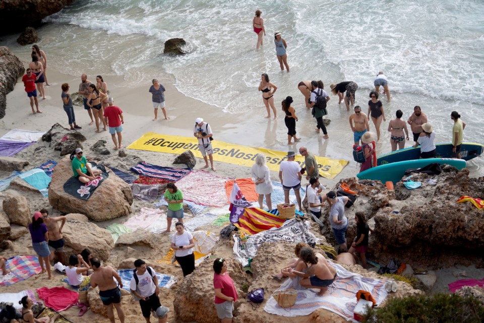 Families and tourists already at the beached were turned away by cops once the zealots arrived