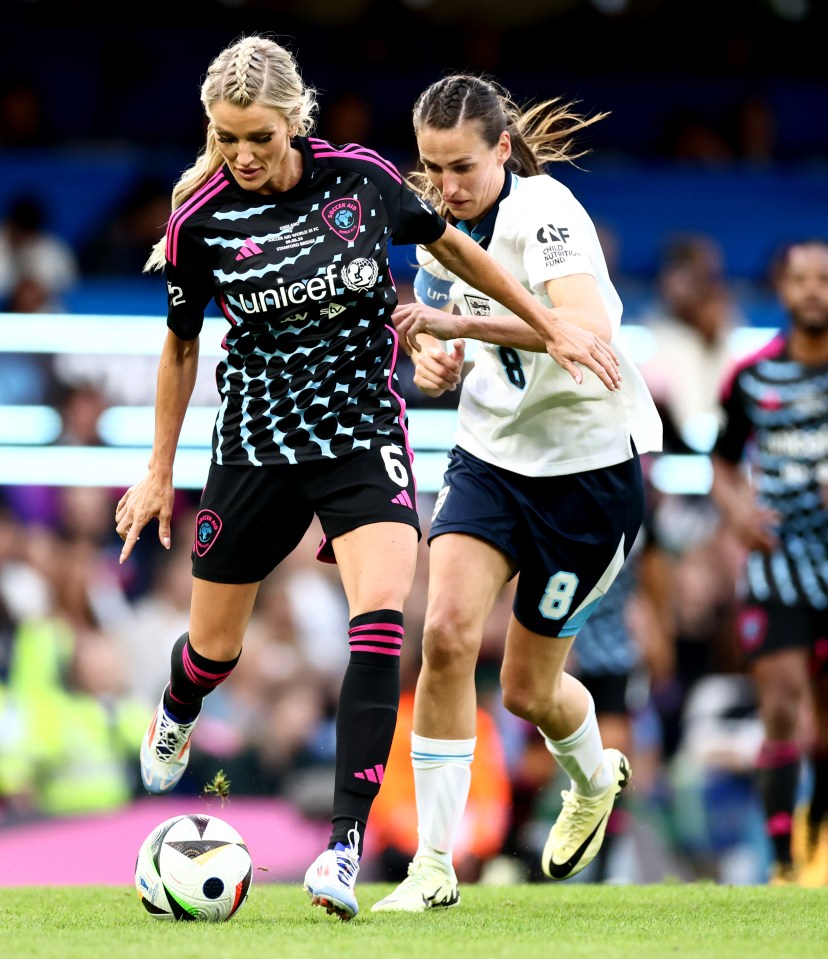 The World XI’s Kaylyn Kyle, left, and Jill Scott