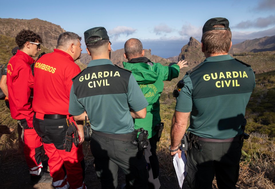 a group of men wearing uniforms that say guardia civil