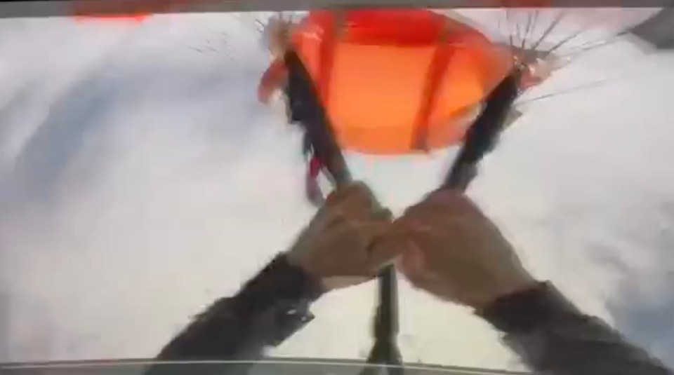 The Russian skydiver could be seen desperately attempting to untangle his parachute