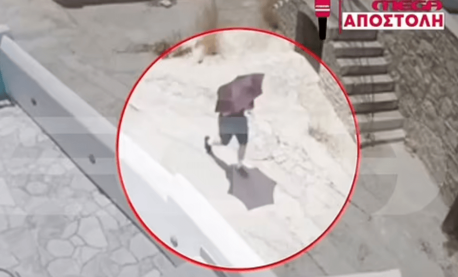 CCTV footage shows the dad-of-four walking past a house holding his umbrella at 2pm on Wednesday
