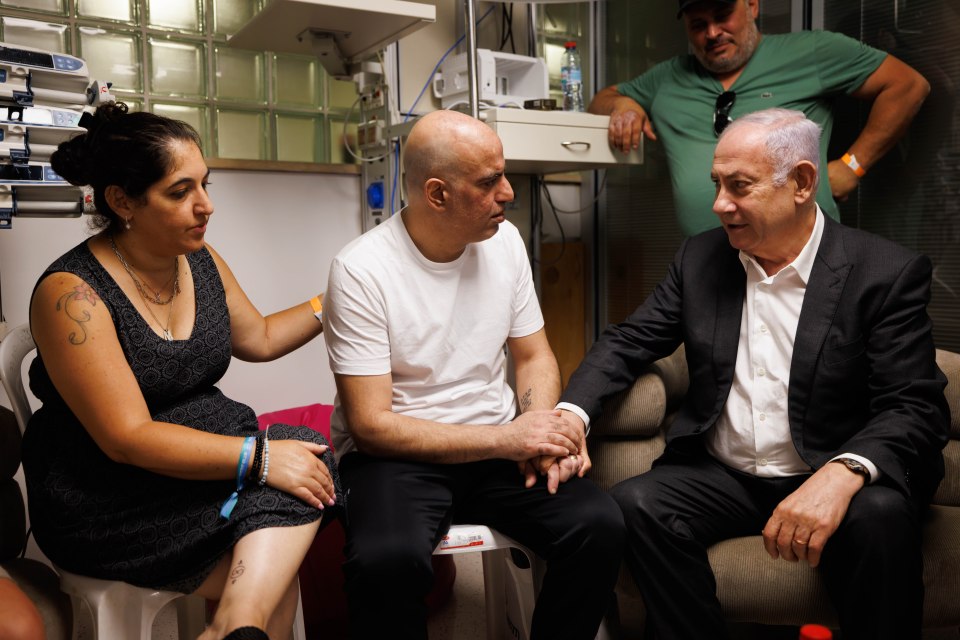 Freed hostage Shlomi Ziv, centre, also met the Israeli PM